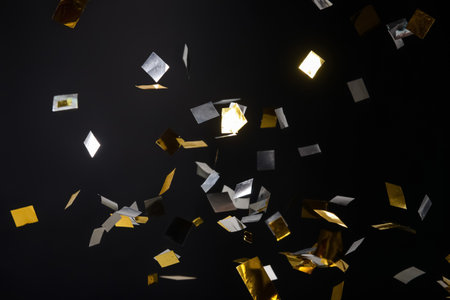 Beautiful confetti on dark backgroundの写真素材