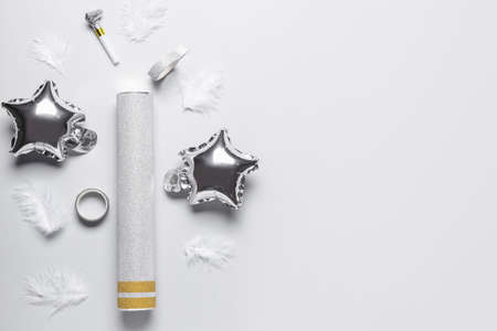 Party set with confetti on white backgroundの写真素材