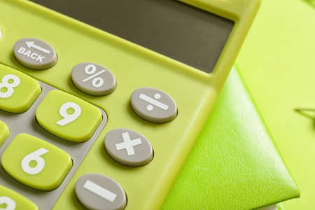 Modern calculator on color background, closeupの写真素材