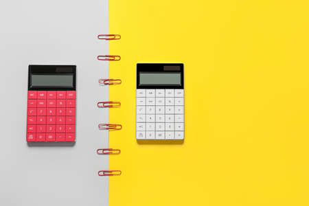 Modern calculators on color backgroundの写真素材