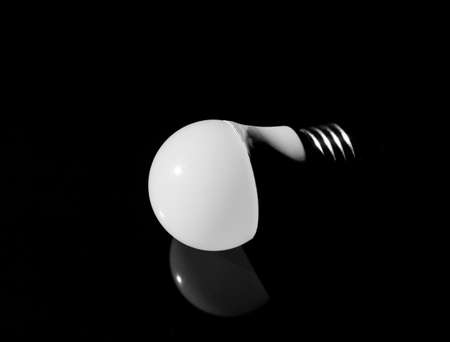 Light bulb on dark backgroundの写真素材