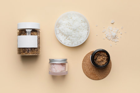 Composition with jars of body scrub on color backgroundの写真素材