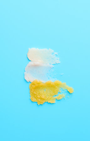 Samples of body scrub on color backgroundの写真素材