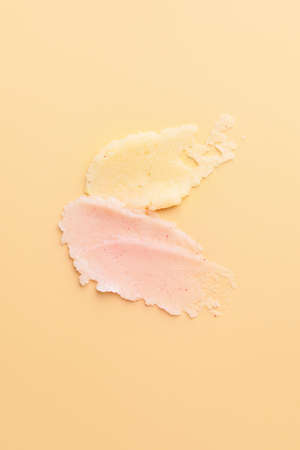 Samples of body scrub on color backgroundの写真素材