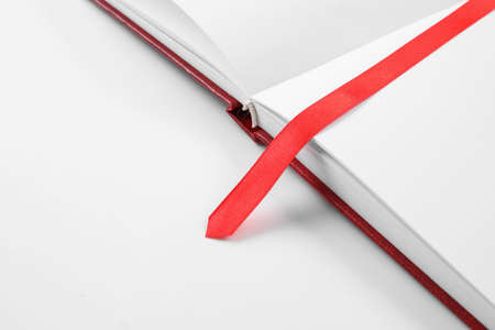 Blank book with bookmark on white backgroundの写真素材