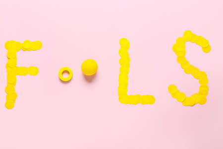 Word FOOLS on color backgroundの写真素材