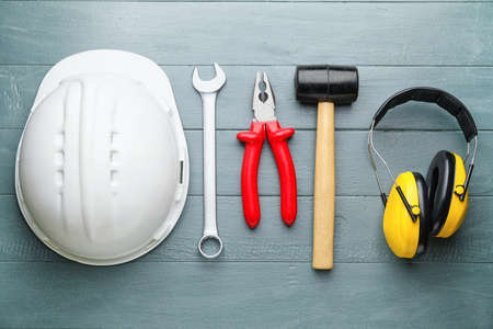 Set of tools on wooden background