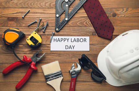 Set of tools on wooden background. Labor Day celebrationの写真素材