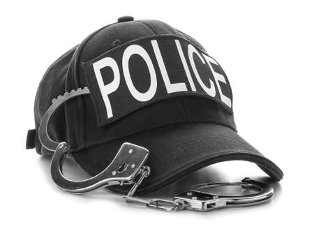 Uniform of policeman with handcuffs on white backgroundの写真素材