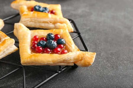 Tray with danish pastry on dark backgroundの写真素材