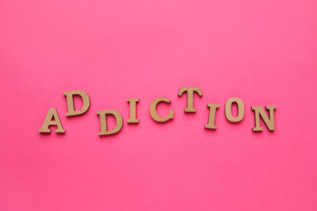 Word ADDICTION on color backgroundの写真素材