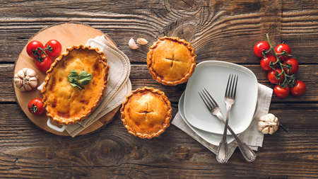 Tasty beef pot pies on tableの写真素材