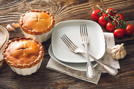Tasty beef pot pies on tableの写真素材