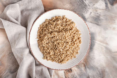 Plate with tasty quinoa on marble backgroundの写真素材