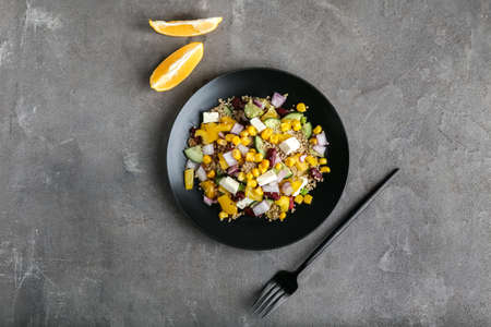 Plate with healthy quinoa salad on grunge backgroundの写真素材