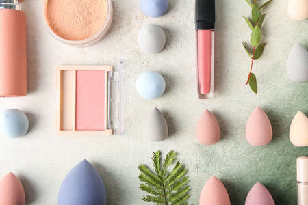Composition with decorative cosmetics on tableの写真素材