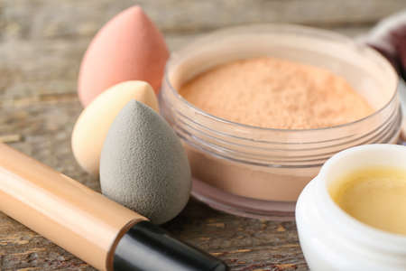 Decorative cosmetics on wooden background, closeupの写真素材