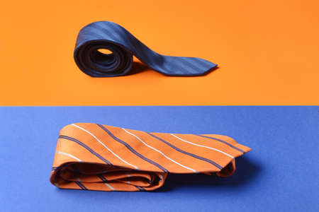 Stylish neckties on color backgroundの写真素材
