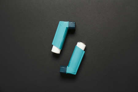 Modern inhalers on dark backgroundの写真素材