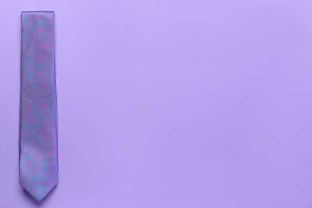 Stylish necktie on color backgroundの写真素材