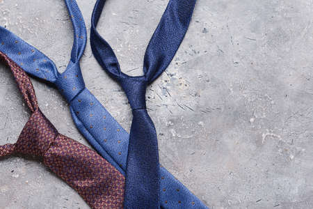 Stylish neckties on grunge backgroundの写真素材