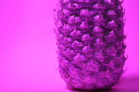 Toned fresh pineapple on color backgroundの写真素材