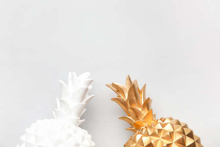 Stylish pineapples on gray backgroundの写真素材
