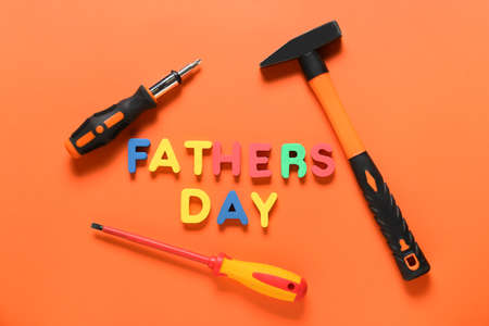 Composition for Father's Day with different tools on color backgroundの写真素材