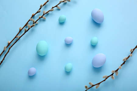 Beautiful Easter eggs on color background