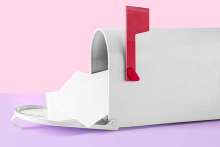 Mail box with letters on color background