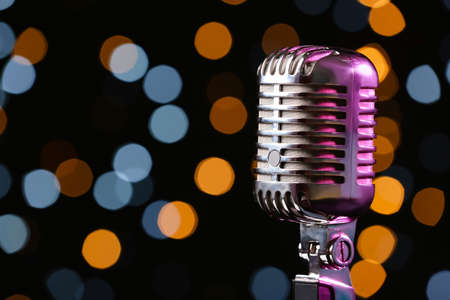 Retro microphone against defocused lights, closeupの写真素材