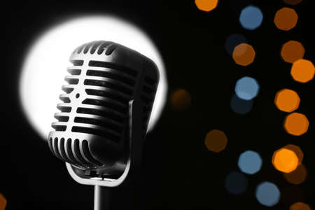Retro microphone against defocused lights, closeupの写真素材