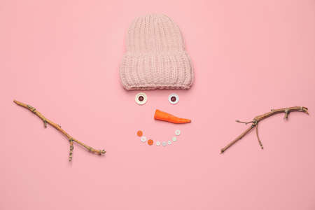 Funny snowman on color backgroundの写真素材