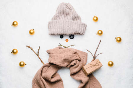 Funny snowman on snow outdoorsの写真素材