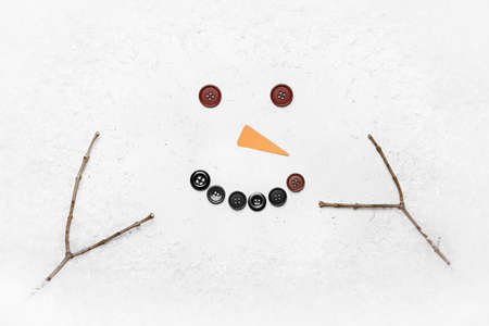 Funny snowman and snow on white backgroundの写真素材