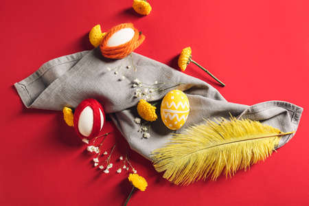 Creative composition with Easter eggs on color backgroundの写真素材