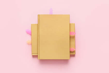 Books with bookmarks on color backgroundの写真素材