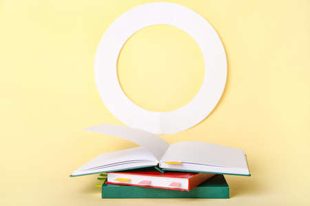 Books with bookmarks on color backgroundの写真素材