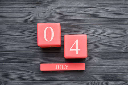 Calendar with date of Independence Day on dark wooden backgroundの写真素材