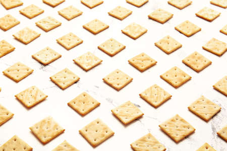 Tasty crackers on light backgroundの写真素材