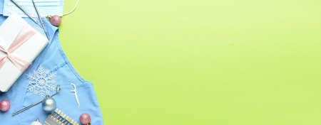 Dentist's supplies and Christmas decor on color background with space for textの写真素材