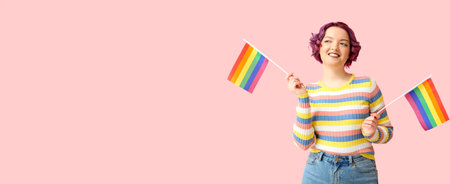 Young woman with LGBT flags on pink background with space for textの写真素材