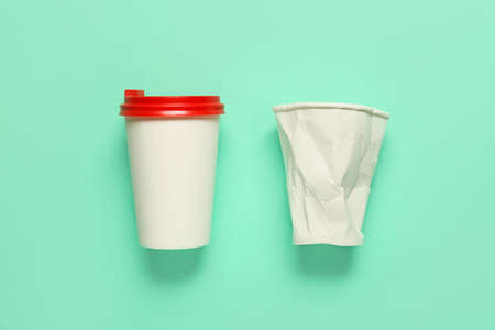 Blank paper cups on color backgroundの写真素材