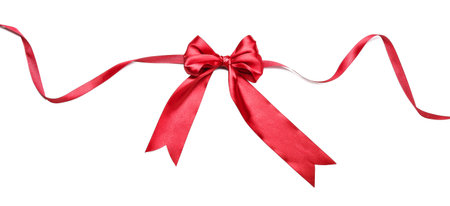 Bow made of red ribbon on white backgroundの写真素材