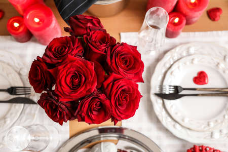 Festive table setting for Valentines Day celebrationの写真素材