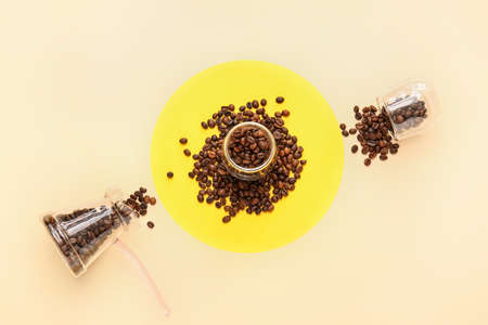 Composition with coffee beans on light background