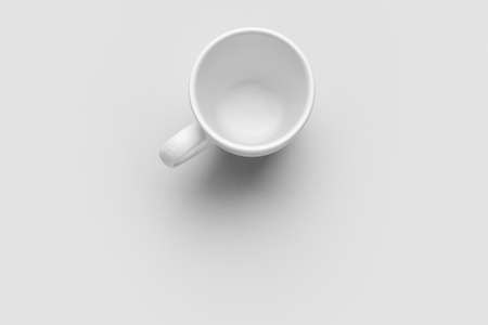Empty cup on light backgroundの写真素材