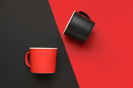 Empty cups on color backgroundの写真素材