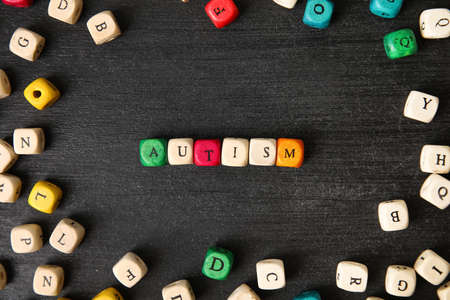 Word AUTISM on dark backgroundの写真素材
