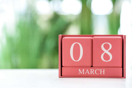 Cube calendar with date MARCH 8 on table. International Women's Day celebrationの写真素材